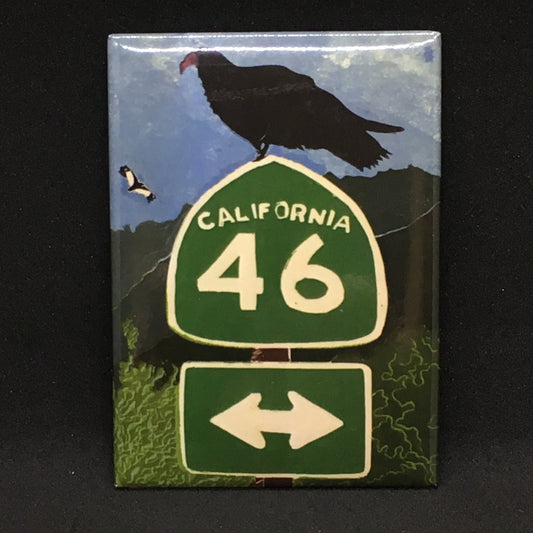 Linocut design on magnet with turkey vulture perched on top of California Highway 46 sign with another vulture flying over the hillside in the distance.